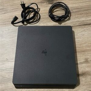 PS4 Slim in great condition comes with cables controller and games IF WANTED.